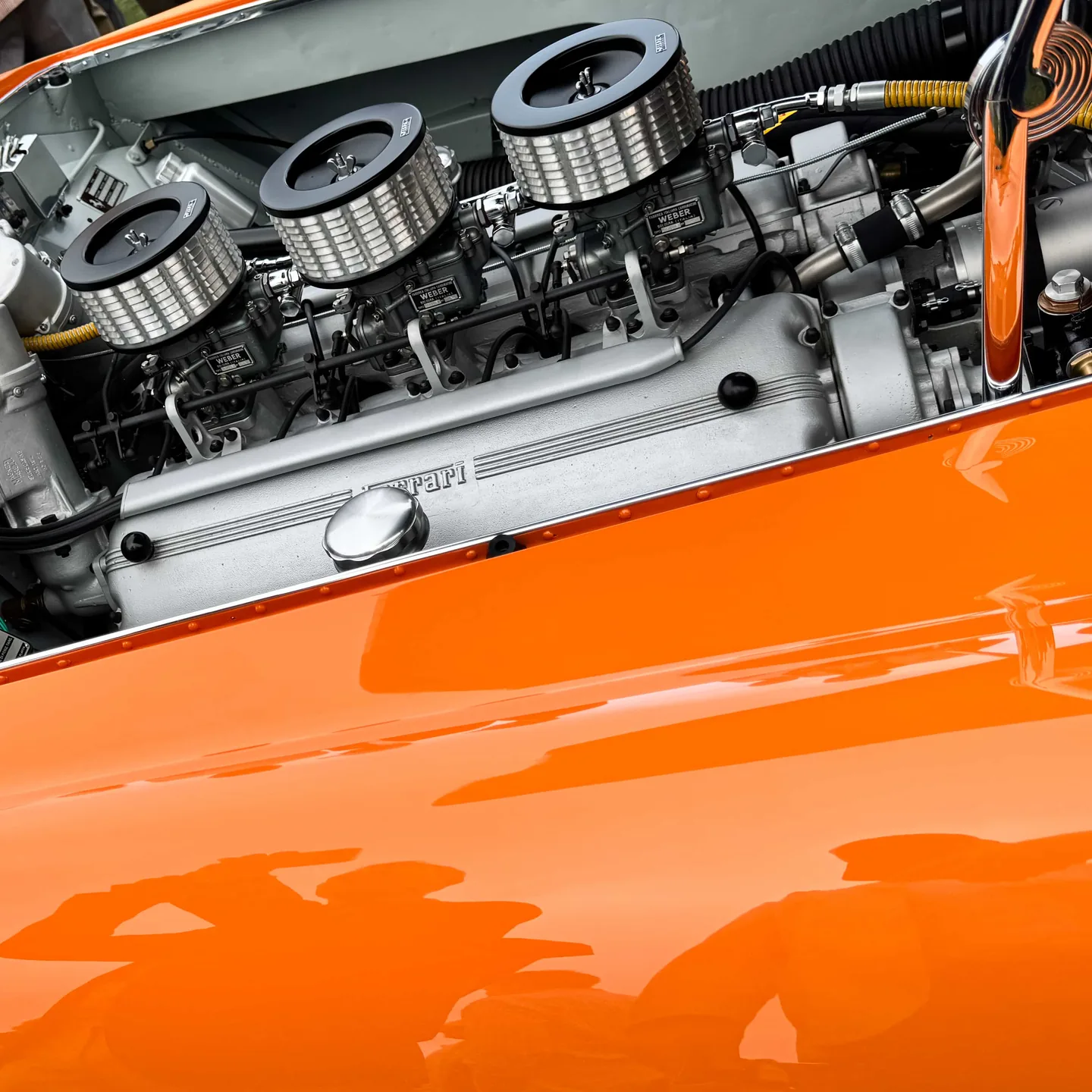Ferrari engine bay with Weber carburetors in collector-grade detail